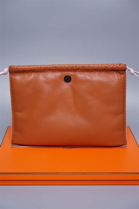 hermes pilo pouch.